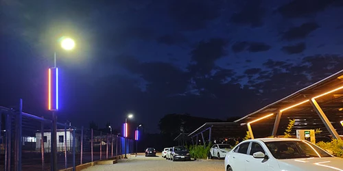 Solar pole street light combining PV panel, battery and LED fixture